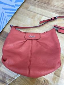 lot 321344 image: Coach Wine Red Leather Crossbody Bag