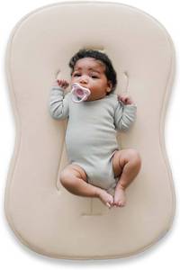 lot 142081 image: Retails for $120 Snuggle Me  Baby Lounger Curve (0-6 Months) - Premium Organic Cotton with Foam Core, Machine-Washable Cover, Buttery-Soft & Breathable Infant Lounger with Travel Bag (30 in x 20 in x 1.9 in) - Natural