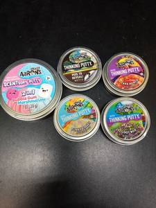 lot 1034 image: Crazy Aarons Thinking Putty Collection 5 Tins Mixed Varieties - Retail $25
