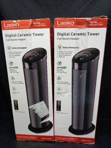 lot 1049 image: (2) Lasko CT22495 22 Ceramic Tower Heater with Remote Control - Retail $192