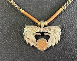 lot 4 image: Pewter and Copper Double Headed Eagle Pendant