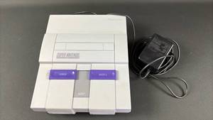 lot 22 image: Super Nintendo SNES Console with Power Adapter