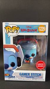 lot 35 image: NIB Funko Pop Disney Lilo & Stitch Gamer Stitch #1229 GameStop Exclusive