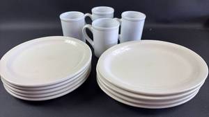 lot 49 image: White and Ivory Ceramic Dinnerware with (5) Round Plates (4) Oval Plates and (4) Mugs
