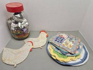 lot 65 image: Vintage Pot Holders, Milk Bottle Lids &  Cookie Cutters