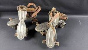 lot 82 image: 2 Pair Vintage Metal Roller Skates from Chicago Roller Skate Company produced during the 1950s or 1960s