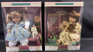 lot 87 image: Classic Treasures Bisque Porcelain Dolls Set of 2 Fine Porcelain Dolls with Accessories