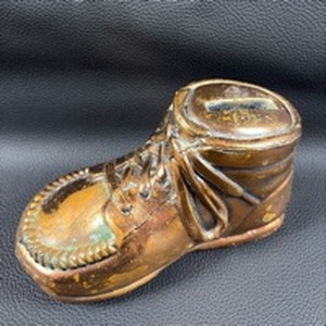 lot 99 image: Bronzed Baby Shoe Bank