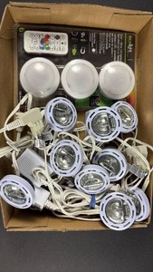 lot 121 image: NIP LED Battery Puck Lights with Remote Control and Puck String Lights