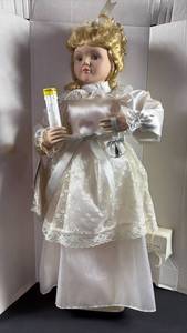 lot 123 image: Approximately 2 Foot Candle Bearing Doll