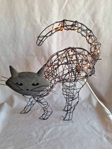 lot 209 image: Large Wire Frame Cat Sculpture with Orange String Lights