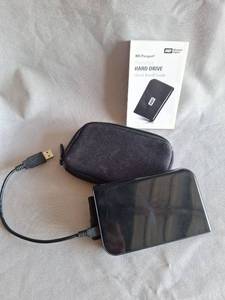 lot 215 image: Factory Reset, Ready To Go WD Passport Portable External Hard Drive with Case and Cable