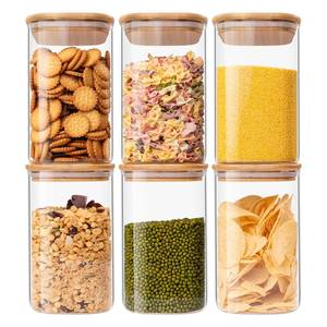 lot 21967 image: Glass Food Storage Jars 37 oz Set of 6,Glass Storage Containers Clear Glass Food Canister with Bamboo Lid Airtight For Serving Tea, Coffee, Flour, Sugar, Candy, Cookie, Spice and More (Square) - Retail $21