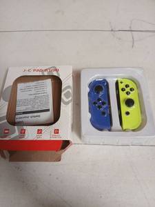 lot 29732 image: Nintendo Joy-Con (LR) - Neon YellowNeon Blue - Retail $89