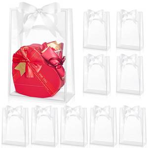 lot 29767 image: Ohuimrt 12 Pack Clear Plastic Gift Bags with Handles, Reusable Party Favor Bags with Ribbon for Birthday, Wedding, Bachelorette Party, 10.2 x 7.1 x 3.1 Inch (White) - Retail $12