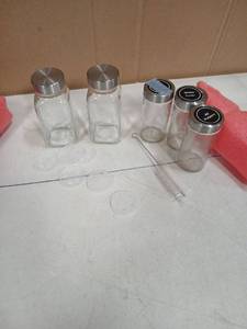 lot 31518 image: Glass Spice Jar Set with Stainless Steel Lids and Cleaning Brush used  - Retail $15
