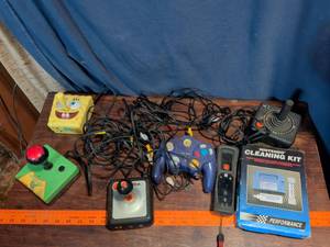 lot 60 image: Classic Gaming Console Collection with Controllers and Accessories