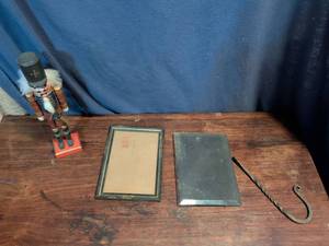 lot 69 image: Christmas Nutcracker, Two Picture Frames and Metal Hook