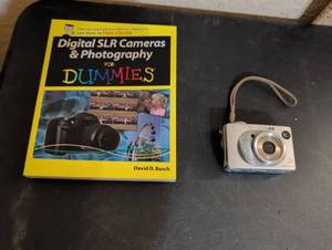 lot 155 image: Sony Cyber-shot Digital Camera with Photography Guide Book
