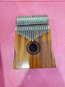 lot 3339 image: 17-Key Kalimba Thumb Piano with Carrying Pouch