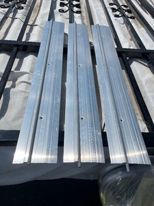 lot 218 image: Bundle of 3 Industrial Grade Aluminum Thresholds - 3 x 4