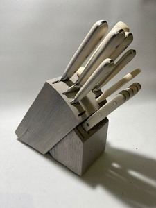 lot 83 image: 12 Piece Martha Stewart Knife Set White Handle - Light Grey Block - 2 Open Spots - Knives Never Been Used