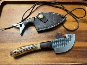lot 34 image: Bundle of 2 Quality Unique Gut Knives -  Shark Design With Finger Hole and Sheath