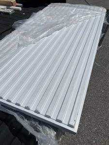lot 76 image: Bundle of 10 Panels - Great for Drop Ceilings - White Ribbed - 2 x 4
