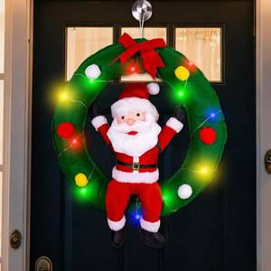 lot 5335 image: 34 Hanging Christmas Decorations, Santa Claus in Wreath with Colorful LED Lights, Xmas Creative Funny Novelty Ornament, Stuffed Santa Home Decor for Wall Fireplace Door Balcony