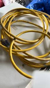 lot 50524 image: Yellow Extension Cord with Electrical Plug