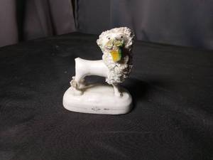 lot 4659 image: White Ceramic Poodle Figurine with Floral Detailing