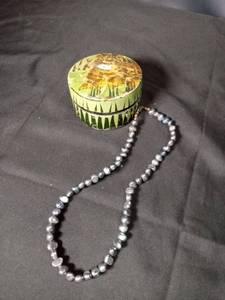 lot 4676 image: Freshwater Pearl Necklace with Lion Design Decorative Box