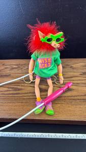 lot 40565 image: Battle Trolls Wise Ages Action Figure with Green Sunglasses