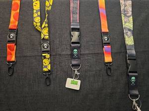 lot 5018 image: Collection of 5 Colorful Lanyards with Keychains