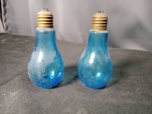 lot 4718 image: Blue Glass Light Bulb Salt and Pepper Shakers Set