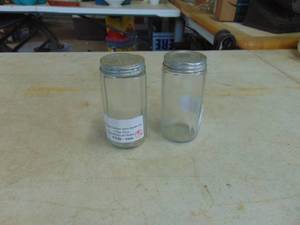 lot 4488 image: Pair of Glass Hoosier Style Shakers