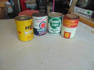 lot 4518 image: 4 Cans of Oil - Full