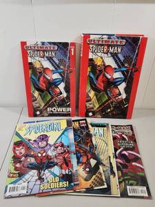 lot 138 image: Ultimate Spider-Man Comic Book Collection with Trade Paperback and Hard Cover