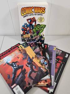 lot 139 image: Comic Wars Marvel Battle for Survival Book with Mixed Marvel Comic Collection
