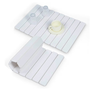 lot 4208 image: Stone Drying Mat for Kitchen Counter, 24x16 Large Collapsible Dish Drying Mat with Non-Slip Pad and Sandpaper, Rolling Design, Quick Dry for Dishes, Bottles, Utensils - Retail $0