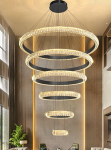 lot 9998 image: MAY BE DIFFERENT THAN PICTURED 1 RING IS BENT Metal Wire Frame Chandelier with Circular Design - Retail $0