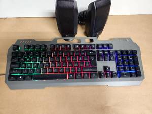lot 25 image: Gaming Keyboard and Logitech S-120 Speakers Set