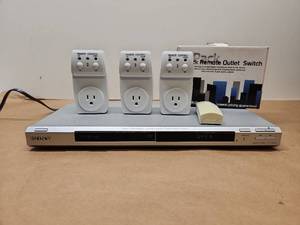 lot 47 image: Sony DVD Player with 3-Pack Remote Control Outlet Switches