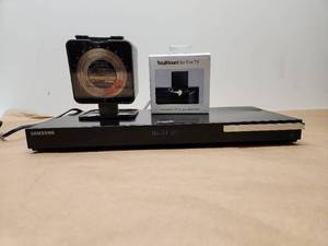 lot 48 image: Samsung Blu-ray Player with TotalMount Fire TV Bundle