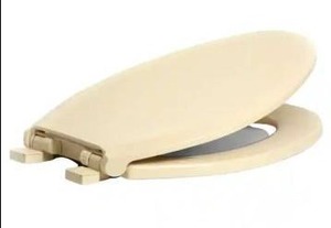 lot 12755 image: CENTOCO Elongated Toilet Seat with Safety Close in Bone