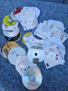 lot 104 image: Mixed DVD and CD Collection Bulk Lot