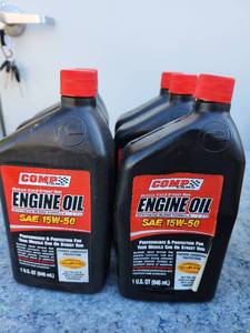 lot 155 image: COMP Cams 15W-50 Engine Oil Six Bottles