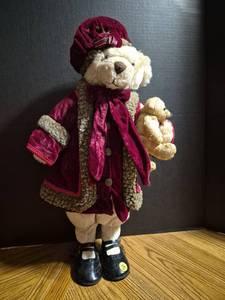 lot 185 image: Collectible Teddy Bear in Burgundy Velvet Outfit with Small Bear