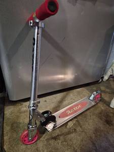 lot 216 image: Razor Kick Scooter with Red Handles and Wheels