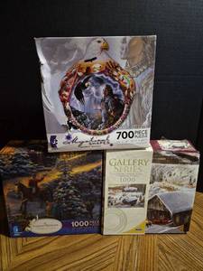 lot 252 image: Jigsaw Puzzle Collection Native American Eagle Theme and Christmas Winter Scenes